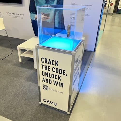 Branded Safe Cracker game on a CAVU aviation exhibition stand, clear acrylic safe lit from below
