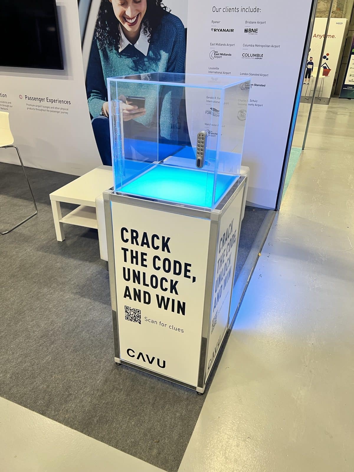 Branded Safe Cracker game on a CAVU aviation exhibition stand, clear acrylic safe lit from below