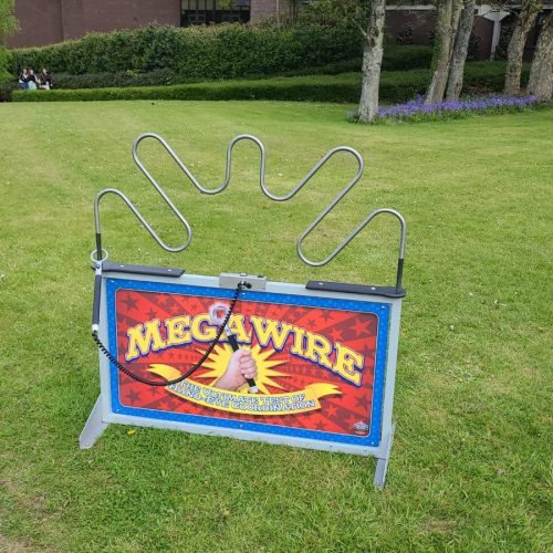 Mega Wire giant buzz wire game set up outdoors at an event
