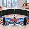 Festive Fast Feet Christmas-dressed Icon Fast Feet football simulator with festive Alpine artwork, set up in an office for a corporate Christmas party (concept artwork)